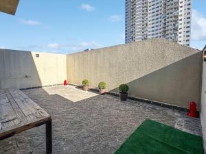 Espaçoso Apartamento com Churrasqueira Expo Imig