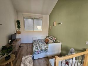 Appartements Le Cocon Vert joli petit T2 - Proximite Puy duFou : photos des chambres