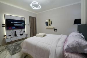 شقة فندقية 2غرفة بجلسة خارجية في مدينة 6 اكتوبر, القاهرة, دخوّل ذاتي