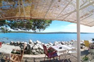 Island of Vitality Lošinj 4-person apartment with large terrace 70m from the beach 