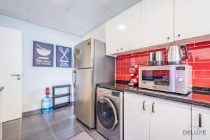 Charming 3BR Townhouse with Study Room in Damac Hills 2 Centaury, Dubailand By Deluxe Holiday Homes