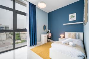 Charming 3BR Townhouse with Study Room in Damac Hills 2 Centaury, Dubailand By Deluxe Holiday Homes