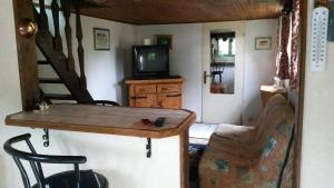 Appartements Aux chants des oiseaux : photos des chambres