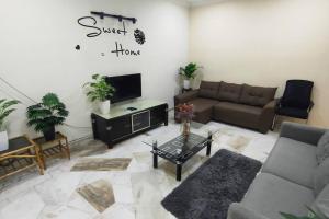 66 Homestay 5 Min to Leaning Tower - 3hvězdičkové hotely ve městě Teluk Intan