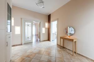 The Old-Clock Apartment by PikHost