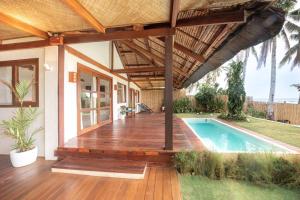 3BR Beachfront Villa, Pool, Garden, Surf Spot