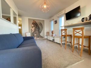 Appartements Studio harmonieusement amenage avec parking et terrasse vers la cite du vin : photos des chambres