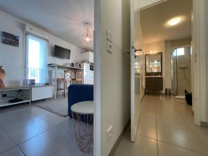 Appartements Studio harmonieusement amenage avec parking et terrasse vers la cite du vin : photos des chambres