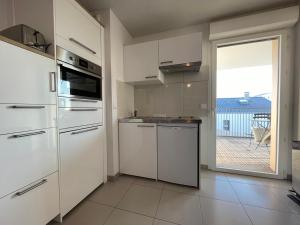 Appartements Studio harmonieusement amenage avec parking et terrasse vers la cite du vin : photos des chambres