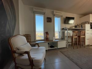 Appartements Studio harmonieusement amenage avec parking et terrasse vers la cite du vin : photos des chambres