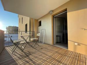 Appartements Studio harmonieusement amenage avec parking et terrasse vers la cite du vin : photos des chambres