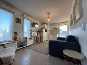 Appartements Studio harmonieusement amenage avec parking et terrasse vers la cite du vin : photos des chambres