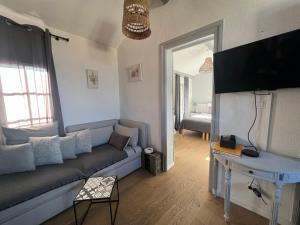 Appartements appartement a 50 m de la place aux herbes : Appartement 2 Chambres