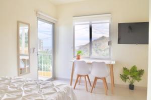 Estudio con vista al mar