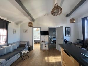 Appartements appartement a 50 m de la place aux herbes : photos des chambres