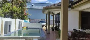 HOMESTAY ALORSETAR TOWNCENTRE by ASTARILA GUESTHOUSE-AmanCentral -iSLAM SAHAJA - 2storey Banglo, Private Pool, BBQ area & sports - max 30pax - Kampong Alor Malai