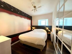 Appartements Le Moovie - Centre-ville- Ecran cinema : photos des chambres