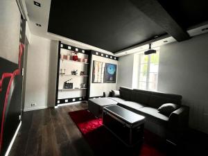Appartements Le Moovie - Centre-ville- Ecran cinema : photos des chambres