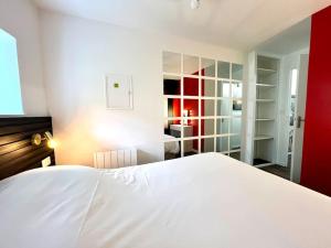 Appartements Le Moovie - Centre-ville- Ecran cinema : photos des chambres