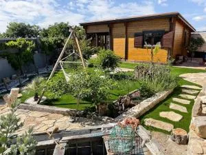 Casa em madeira com jardim privado - Senhora dos Remedios