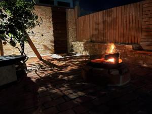 Casa em madeira com jardim privado