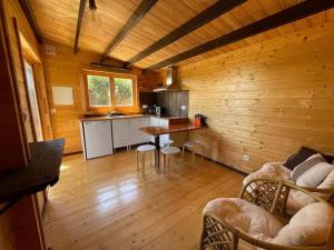 Casa em madeira com jardim privado