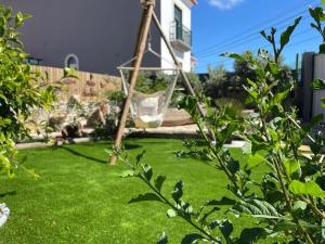 Casa em madeira com jardim privado