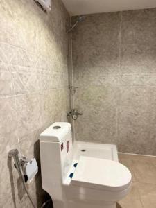 Studio overlooking pool amid flowering and quiet