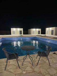 Studio overlooking pool amid flowering and quiet