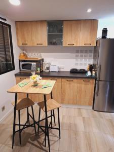 Maisons d'hotes Joli studio 25m2 avec cuisine : photos des chambres