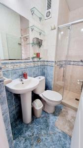 Habitación en casa de Luis con espacios compartidos