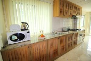 BUTTERFLY GARDEN BOUTIQUE RESIDENCES by Frasier, A Lifestyle Destination Apt and Villas 1 to 3 Bedroom units, 2 Full Bathrooms, Rain shower, Spa bath, Complete kitchen, Staff 24-7,Fast fiber optic WIFI, 55" SMART TVs, Free BBQ,