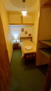 Habitacion individual con baño compartido