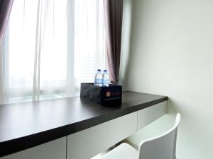 Cozy Studio at 20th Floor Grand Dhika City Apartment By Travelio