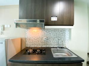 Cozy Studio at 20th Floor Grand Dhika City Apartment By Travelio