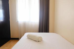 Homey 2BR at Braga City Walk Apartment By Travelio