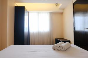 Homey 2BR at Braga City Walk Apartment By Travelio