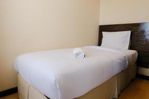 Homey 2BR at Braga City Walk Apartment By Travelio