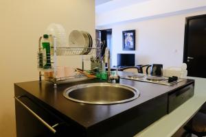 Homey 2BR at Braga City Walk Apartment By Travelio