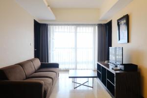 Homey 2BR at Braga City Walk Apartment By Travelio