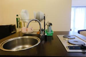 Homey 2BR at Braga City Walk Apartment By Travelio