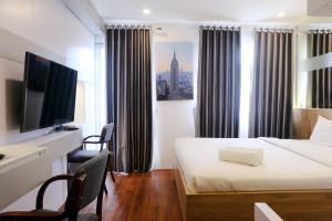 Best Location Studio Apartment at Grand Asia Afrika By Travelio