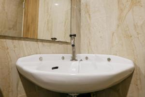 Best Location Studio Apartment at Grand Asia Afrika By Travelio