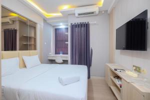 Cozy and Nice Studio at Transpark Cibubur Apartment By Travelio