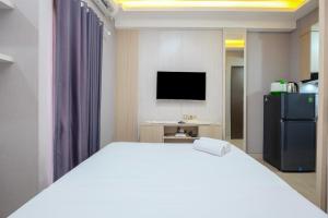 Cozy and Nice Studio at Transpark Cibubur Apartment By Travelio