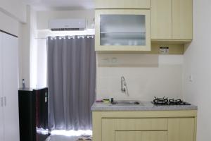 Simple and Enjoy Living Studio Room at Cinere Resort Apartment By Travelio