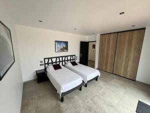 Villas Villa moderne piscine privative hauteurs de Nimes : photos des chambres