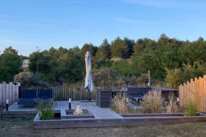 Maisons de vacances Entre dunes et pins : photos des chambres