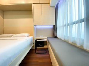 Pleasant and Tidy Studio Apartment Springlake Summarecon Bekasi By Travelio