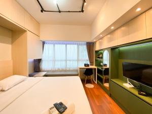 Pleasant and Tidy Studio Apartment Springlake Summarecon Bekasi By Travelio
